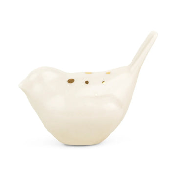 Decorative porcelain bird by Anne Black inspired by Columbine, featuring delicate gold dot details and Tivoli heritage.