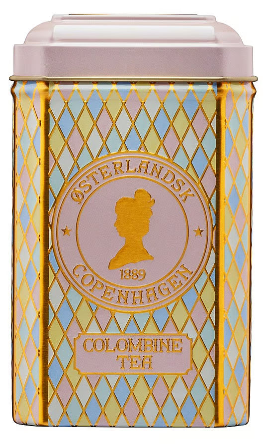 Colombine Tea fra Østerlandsk Copenhagen i dekorativ pastelfarvet tedåse med guldfarvede detaljer og klassisk harlekinmønster.