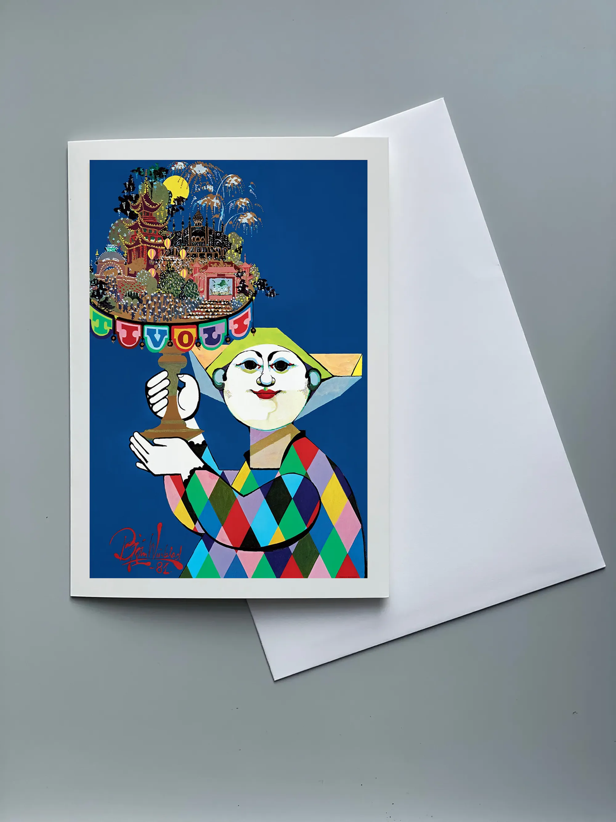 Tivoli foldkort med Bjørn Wiinblad-motiv fra 1981. Farverig illustration i Wiinblads karakteristiske stil med harlekinfigur, Tivoli-eventyr, fyrværkeri og dekorative detaljer på blå baggrund. Leveres med hvid kuvert.
