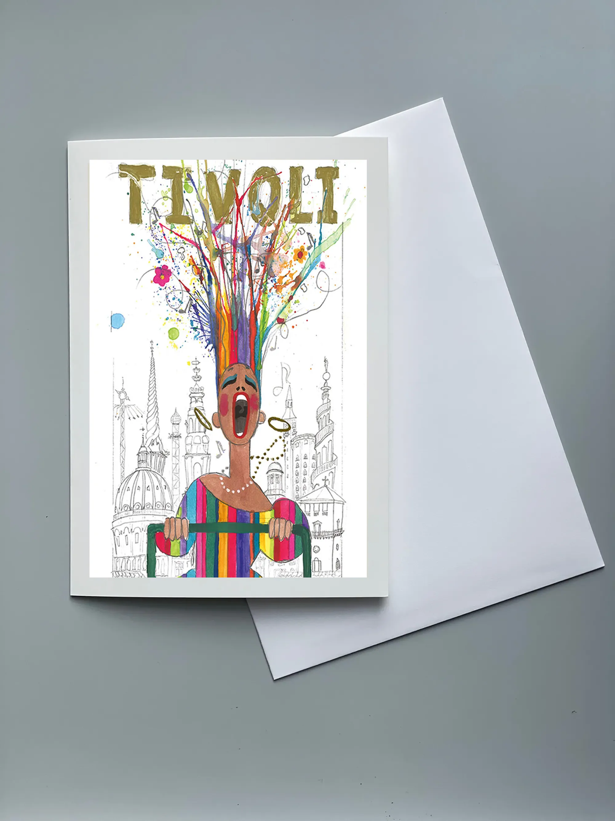 Tivoli foldkort med farverig illustration af en figur i stribet tøj foran Københavns ikoniske bygninger. Motivet har farverige penselstrøg, konfetti-lignende detaljer og teksten "TIVOLI" øverst. Kortet leveres med hvid kuvert.